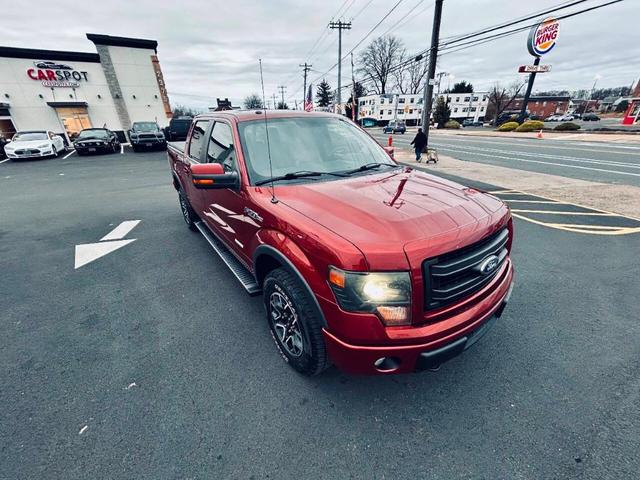 Photo of 2014 Burgundy Ford F-150