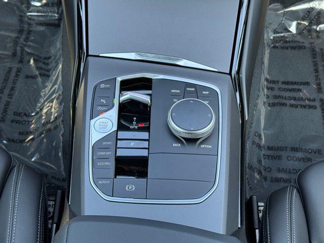 Photo of 2024 Black Sapphire Metallic BMW 230