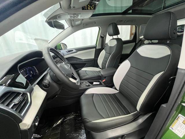 Photo of 2025 Bright Moss Green Volkswagen Taos
