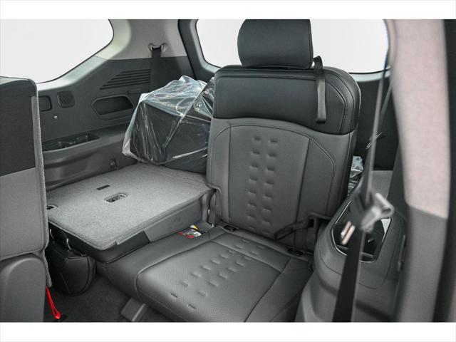 Photo of 2026 Ivory Silver Kia EV9