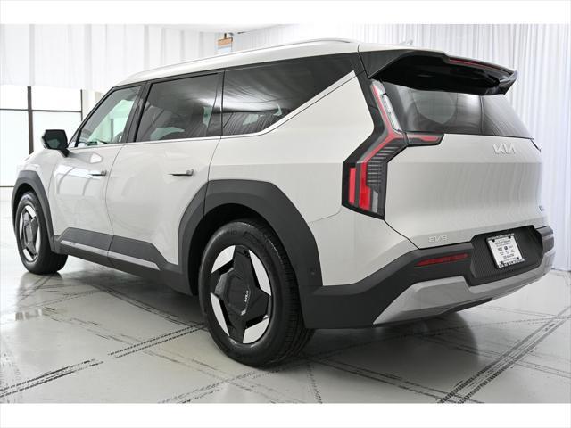 Photo of 2026 Ivory Silver Kia EV9