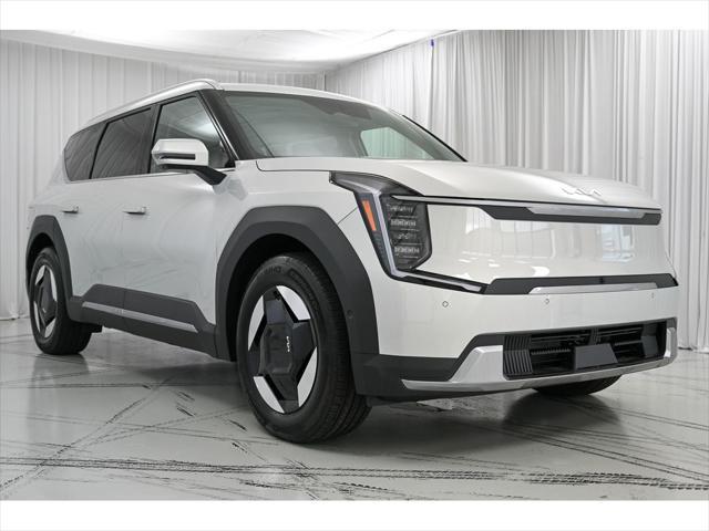Photo of 2026 Ivory Silver Kia EV9