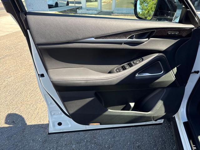 Photo of 2024 Majestic White/Black Obsidian INFINITI QX60
