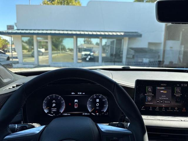 Photo of 2024 Majestic White/Black Obsidian INFINITI QX60