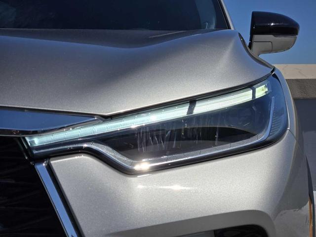 Photo of 2025 Warm Titanium INFINITI QX60