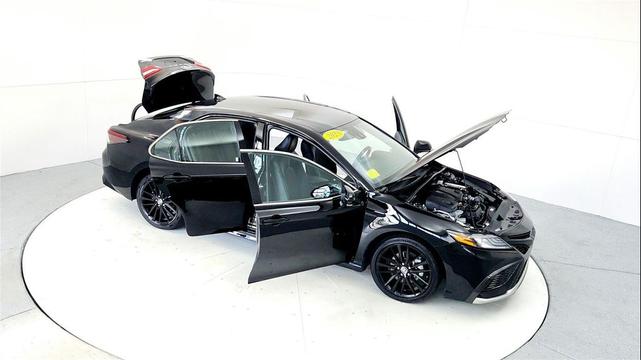 Photo of 2023 Midnight Black Metallic Toyota Camry