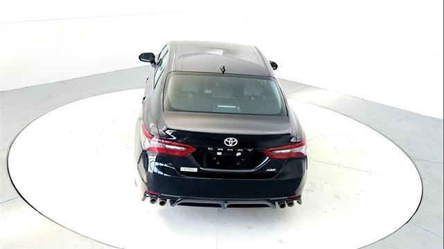 Photo of 2023 Midnight Black Metallic Toyota Camry