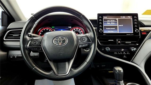 Photo of 2023 Midnight Black Metallic Toyota Camry