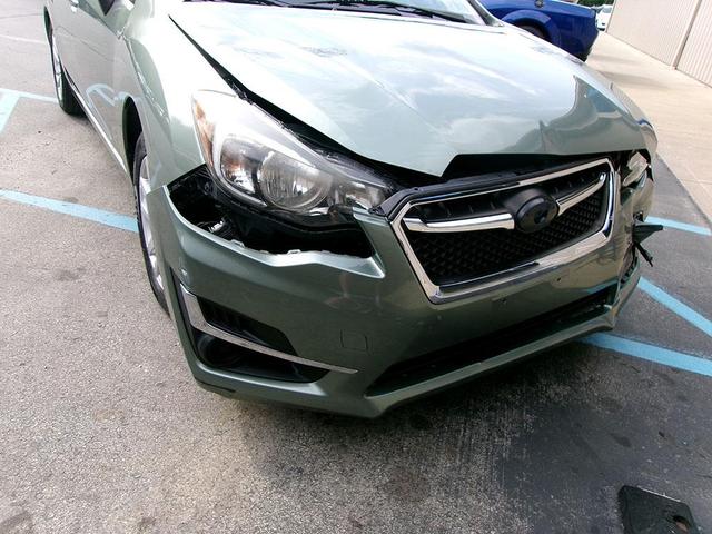 Photo of 2015 Jasmine Green Metallic Subaru Impreza