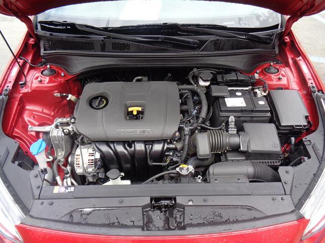 Photo of 2021 Burgundy Kia Forte