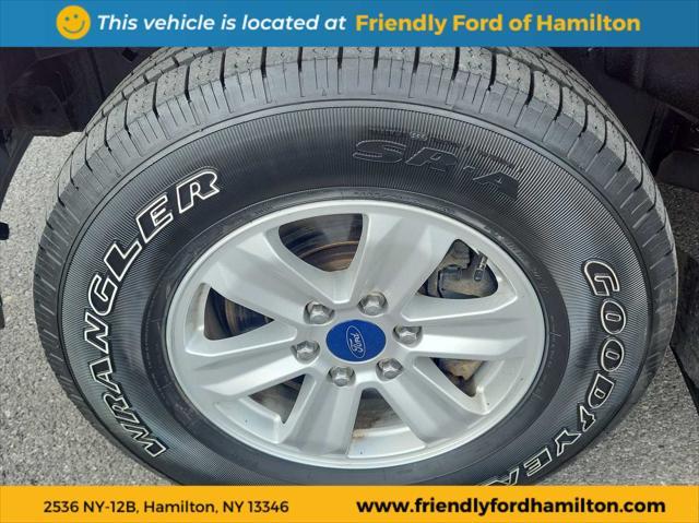 Photo of 2015 Ruby Red Metallic Tinted Clearcoat Ford F-150