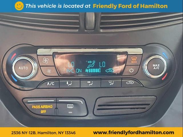 Photo of 2015 Tuxedo Black Ford Escape