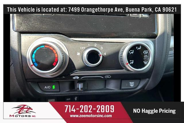 Photo of 2015 White Orchid Pearl Honda Fit