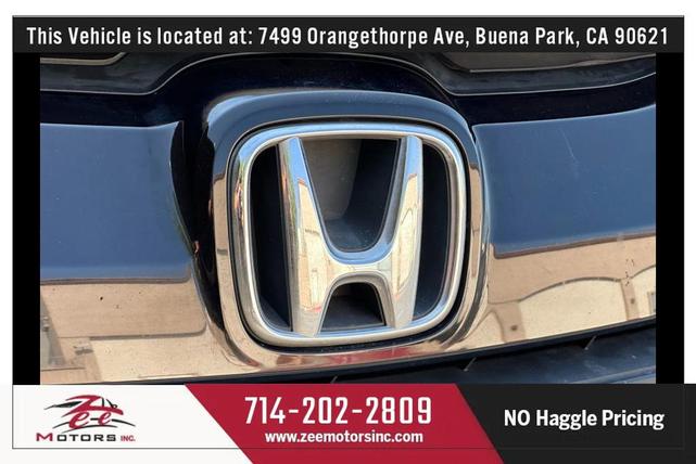 Photo of 2015 White Orchid Pearl Honda Fit