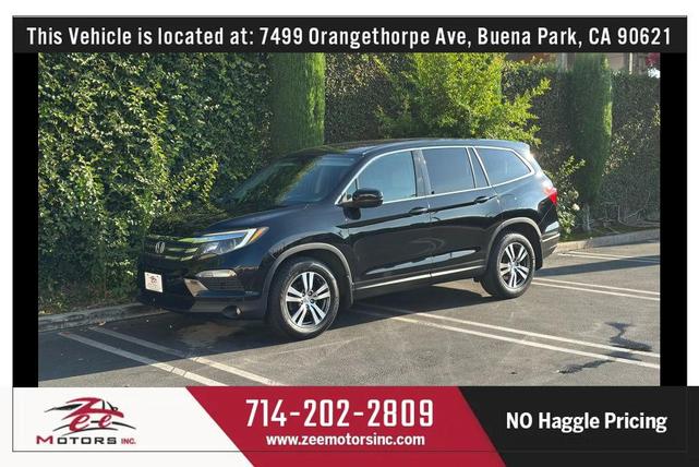 Photo of 2016 Crystal Black Pearl Honda Pilot