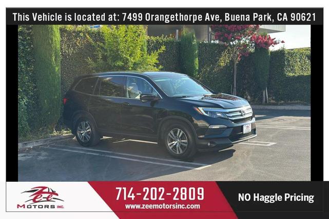 Photo of 2016 Crystal Black Pearl Honda Pilot