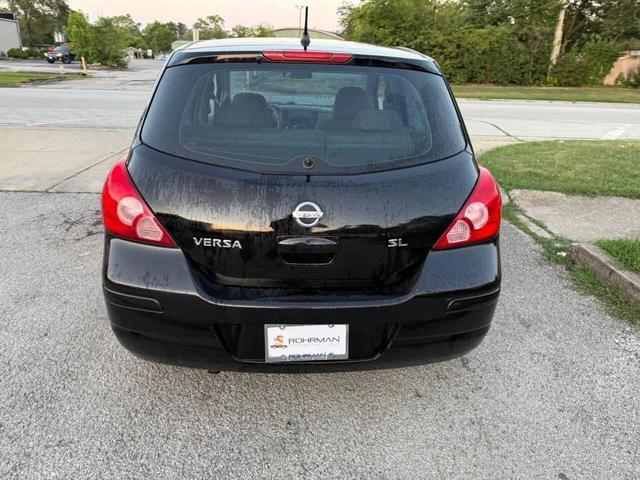 Photo of 2008 Super Black Nissan Versa