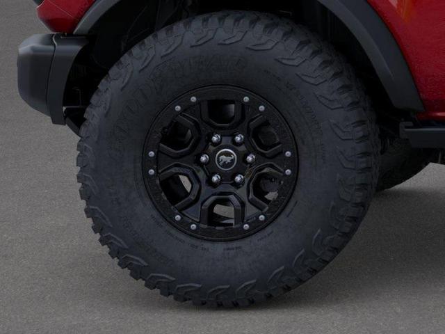 Photo of 2025 Ruby Red Metallic Tinted Clearcoat Ford Bronco