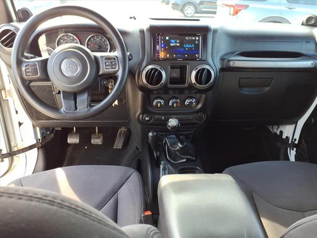 Photo of 2014 Bright White Clearcoat Jeep Wrangler Unlimited