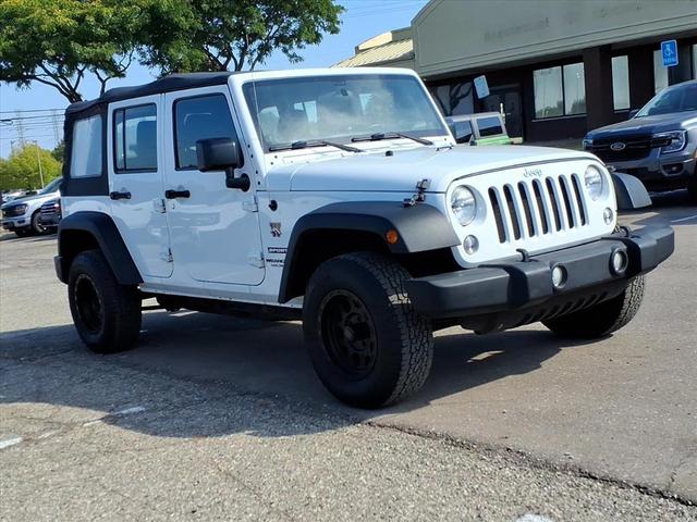 Photo of 2014 Bright White Clearcoat Jeep Wrangler Unlimited