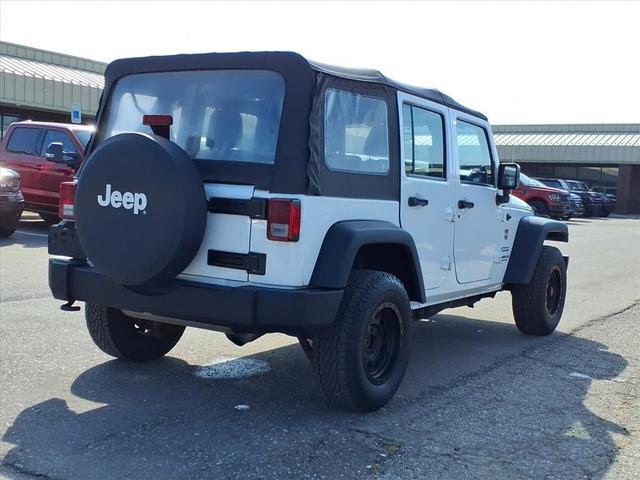 Photo of 2014 Bright White Clearcoat Jeep Wrangler Unlimited