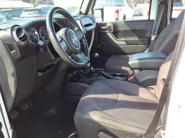 Photo of 2014 Bright White Clearcoat Jeep Wrangler Unlimited