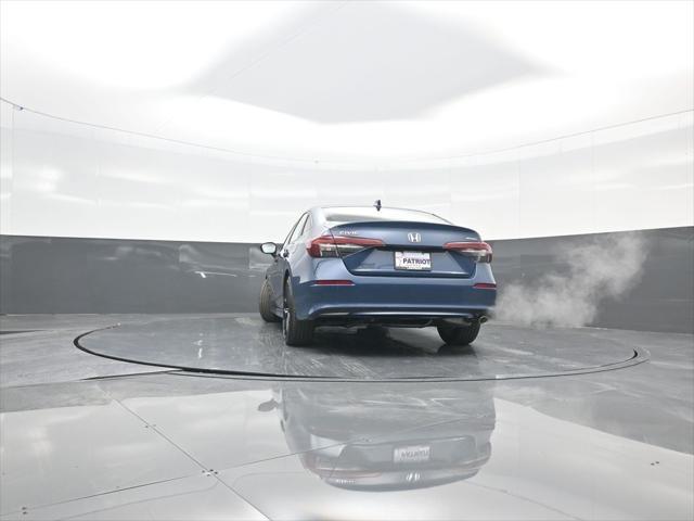 Photo of 2025 Blue Lagoon Pearl Honda Civic