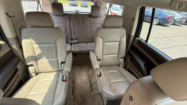 Photo of 2015 Gold Chevrolet Suburban