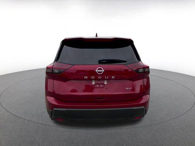 Photo of 2024 Scarlet Ember Tintcoat Nissan Rogue