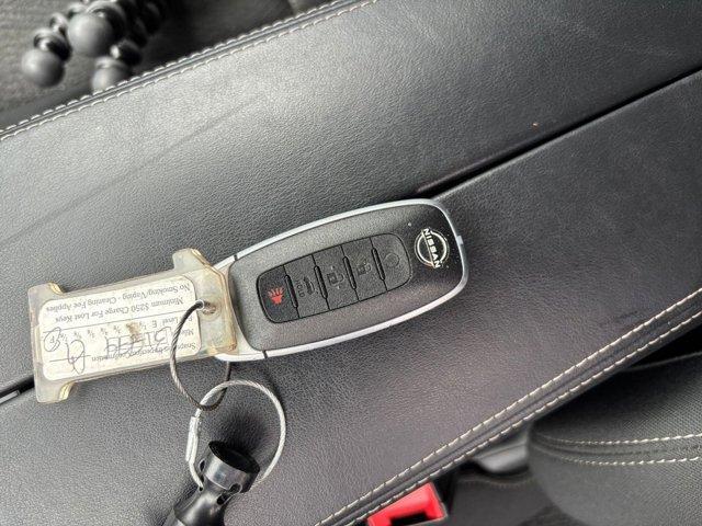 Photo of 2024 Scarlet Ember Tintcoat Nissan Rogue