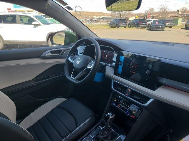 Photo of 2025 Bright Moss Green Volkswagen Taos