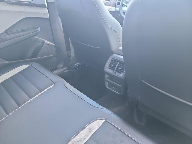 Photo of 2025 Bright Moss Green Volkswagen Taos