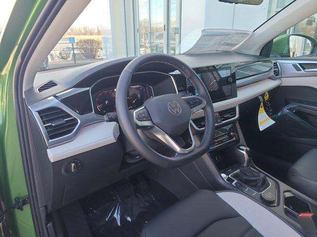Photo of 2025 Bright Moss Green Volkswagen Taos