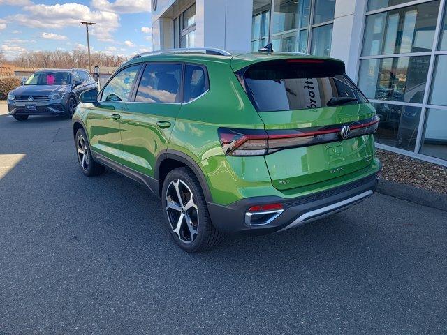 Photo of 2025 Bright Moss Green Volkswagen Taos