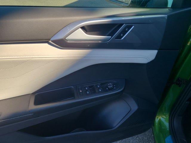 Photo of 2025 Bright Moss Green Volkswagen Taos