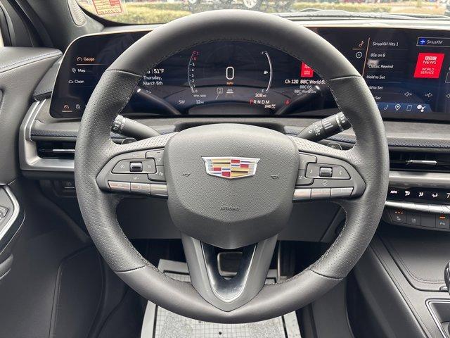 Photo of 2025 Crystal White Tri-Coat Cadillac XT4