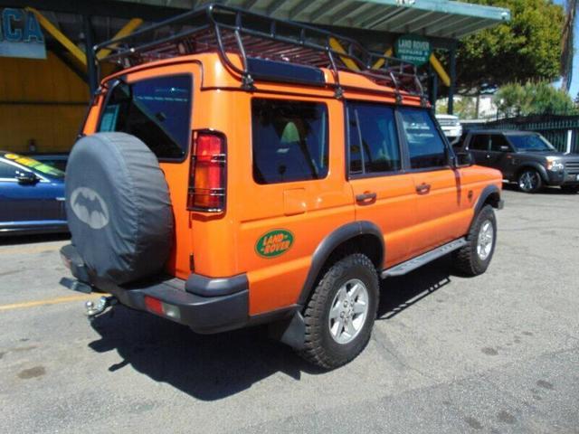 Photo of 2003 Orange Land Rover Discovery