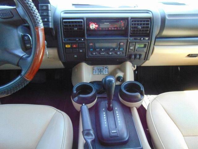 Photo of 2003 Orange Land Rover Discovery