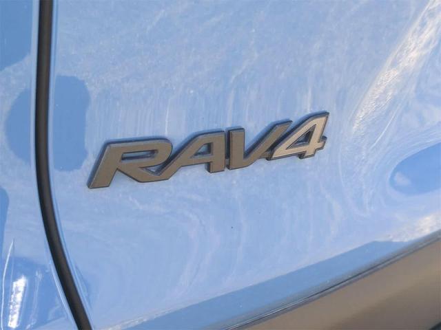 Photo of 2022 Cavalry Blue w/Ice Edge Roof Toyota RAV4
