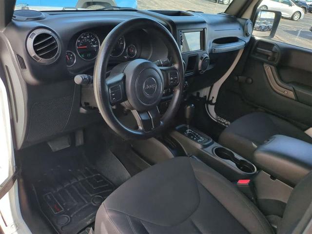 Photo of 2015 Bright White Jeep Wrangler