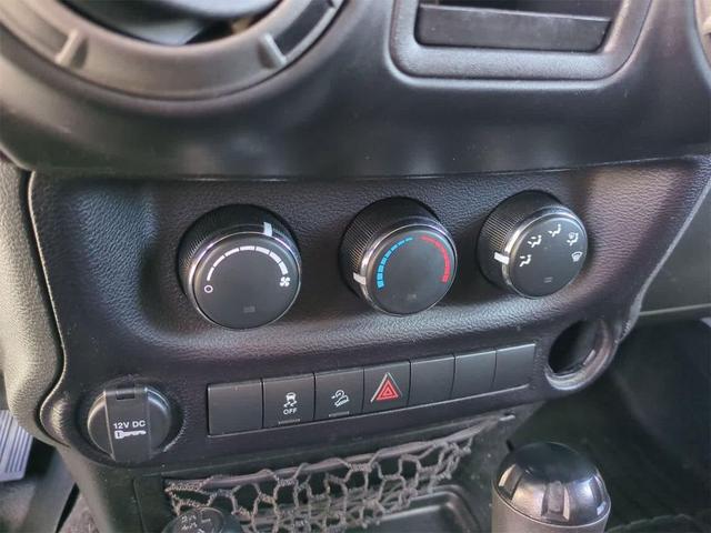 Photo of 2015 Bright White Jeep Wrangler