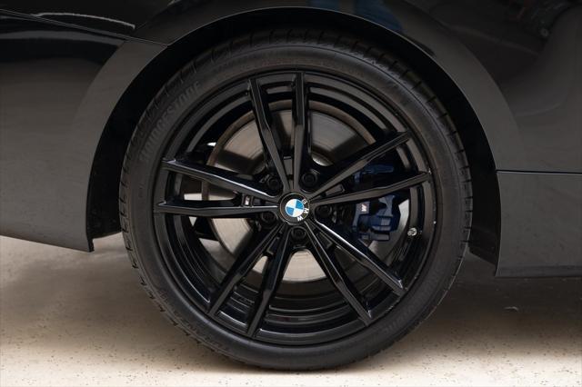 Photo of 2024 Black Sapphire Metallic BMW M440