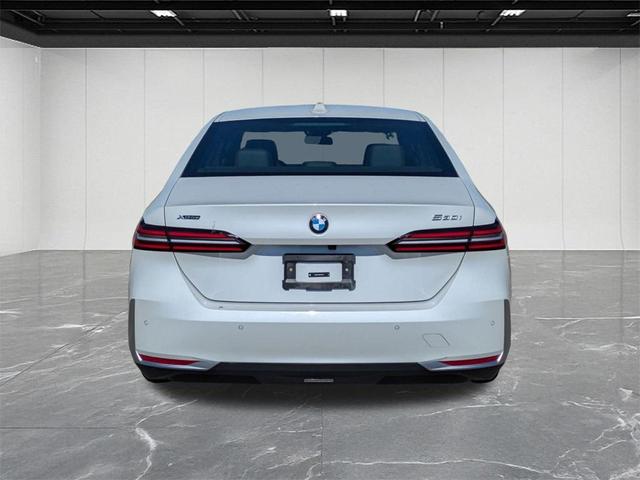 Photo of 2024 Mineral White Metallic BMW 530