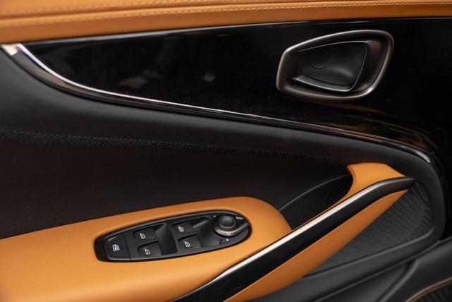 Photo of 2025 Ultramarine Black Aston Martin DBX