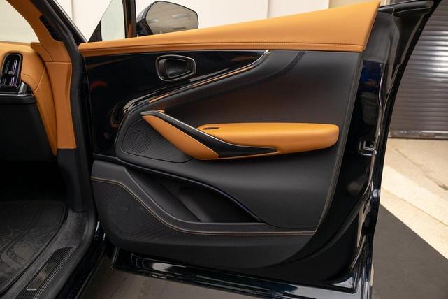 Photo of 2025 Ultramarine Black Aston Martin DBX