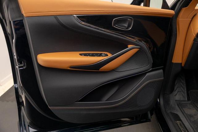 Photo of 2025 Ultramarine Black Aston Martin DBX