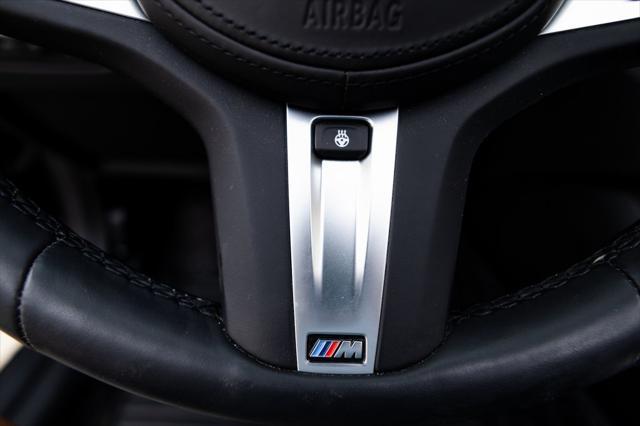 Photo of 2023 Black Sapphire Metallic BMW M440