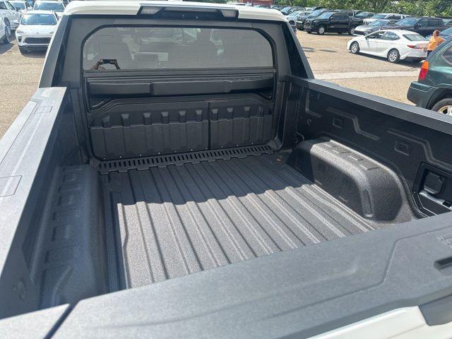 Photo of 2026 Summit White GMC Sierra EV