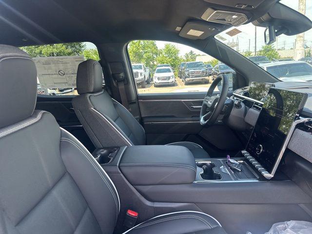 Photo of 2026 Deep Ocean Metallic GMC Sierra EV