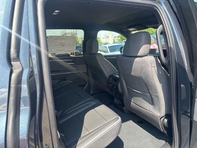 Photo of 2026 Deep Ocean Metallic GMC Sierra EV